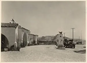 Historic photo of the Richfield station forecourt with a parked car